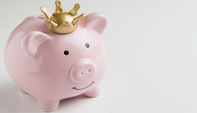 Piggy bank wearing a crown
